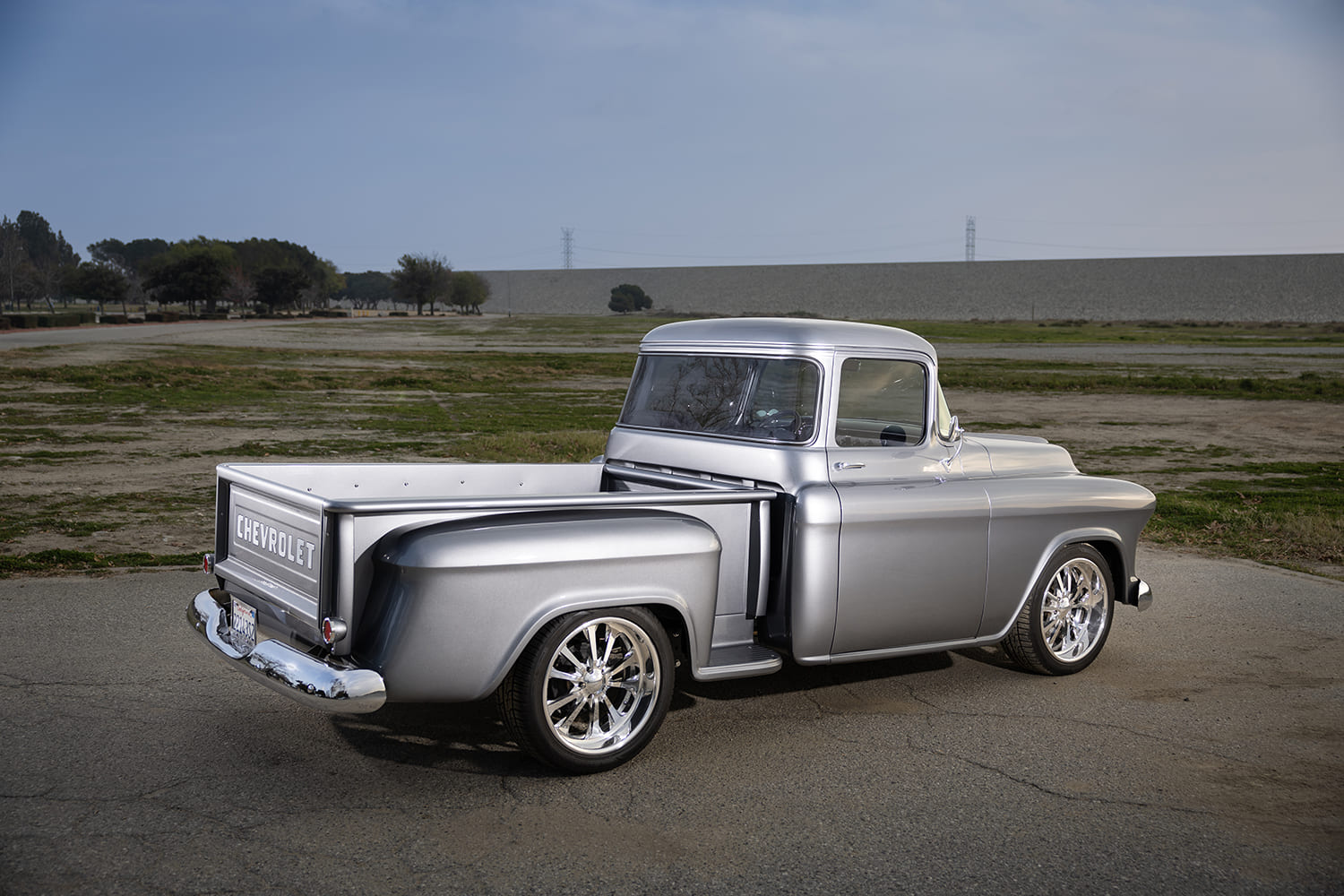 06 1957 Chevrolet custom truck showing rear fender curves and flush tailgate fitment