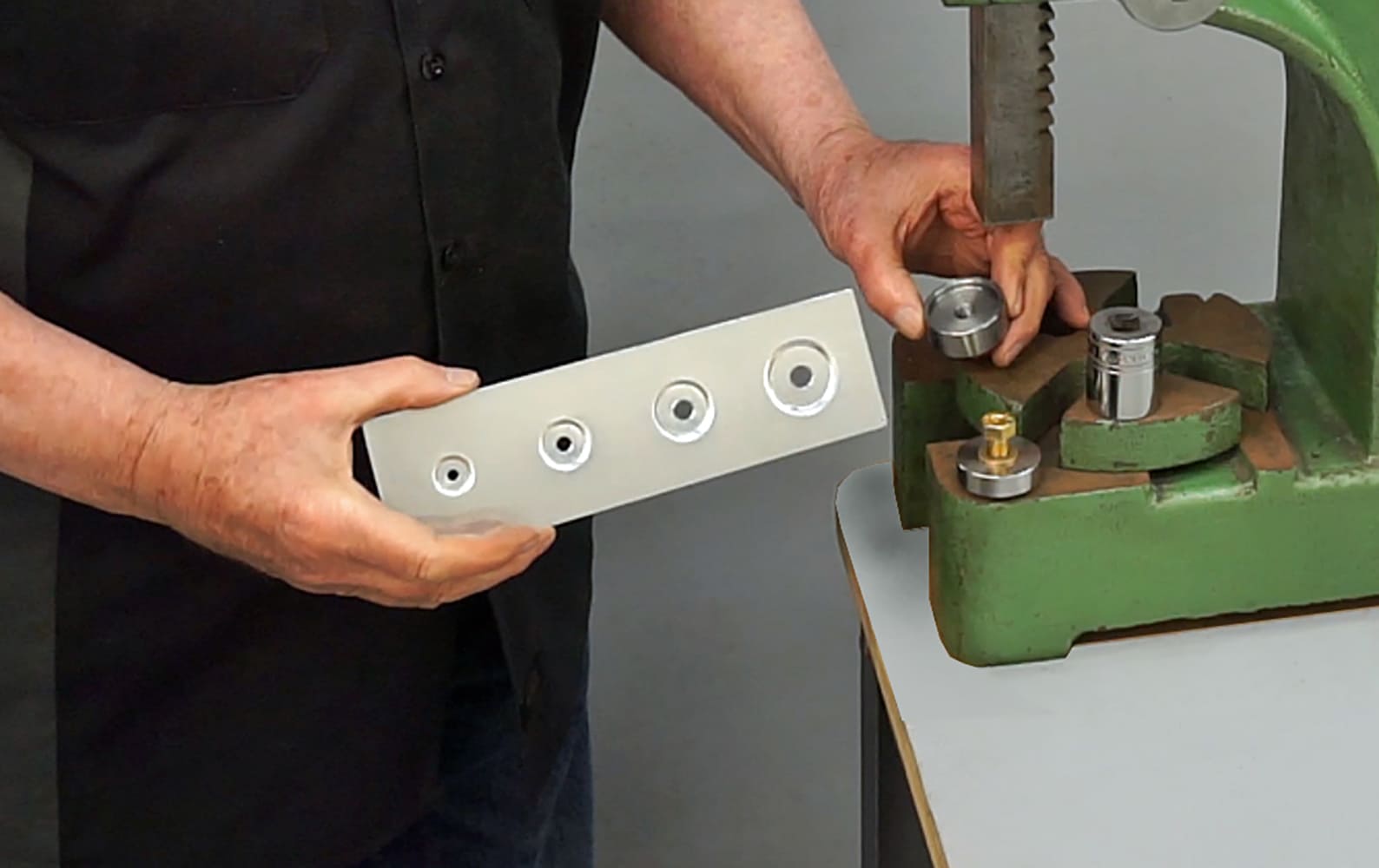 06 Finished metal strip showcasing evenly spaced pressed dimple holes