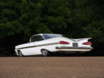 06 Rear low angle of 1959 Impala highlighting iconic cat eye taillights and sweeping fins