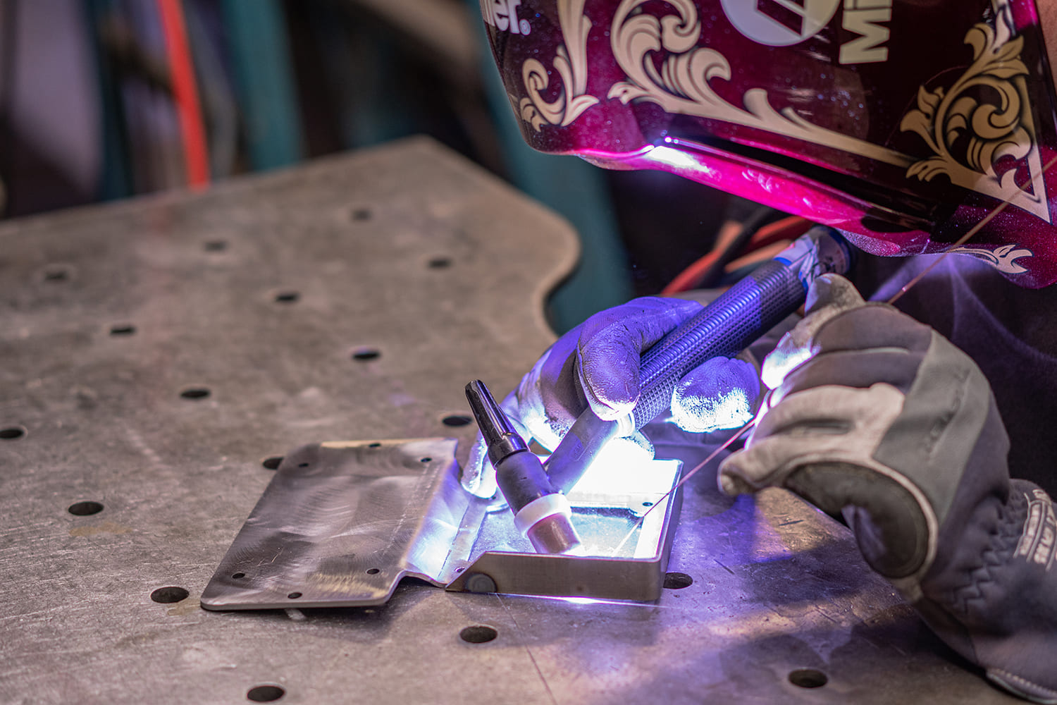 06 TIG welding bracket for AccuAir tank setup precise beadwork on aluminum mount