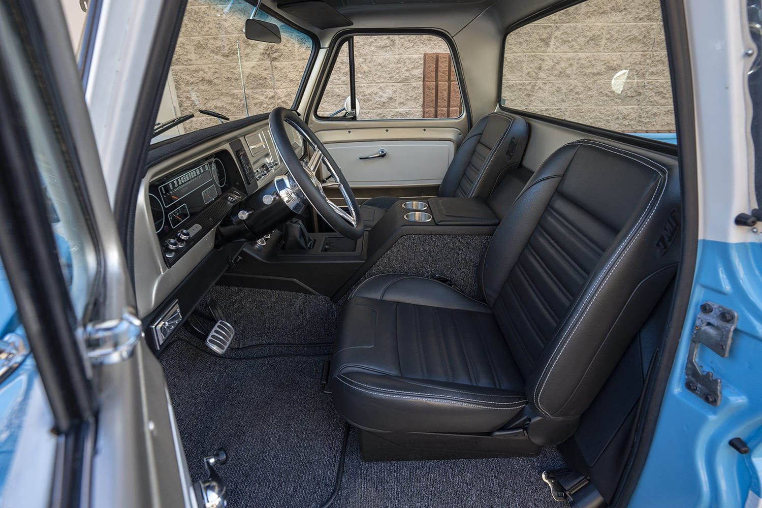 07 1965 C10 restomod interior black leather bucket seats and custom console