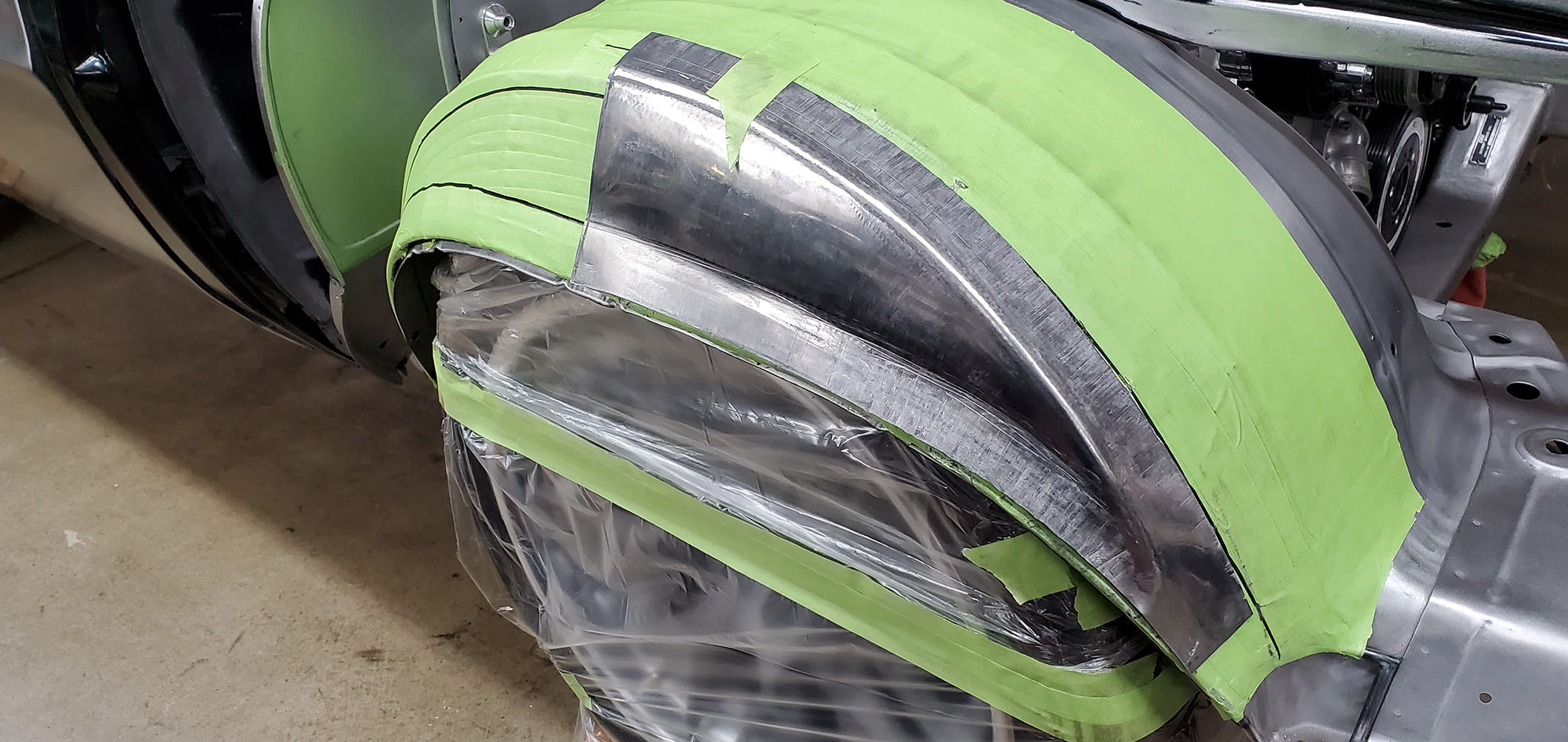 07 1969 Camaro custom tub fabrication layout green tape metal shaping