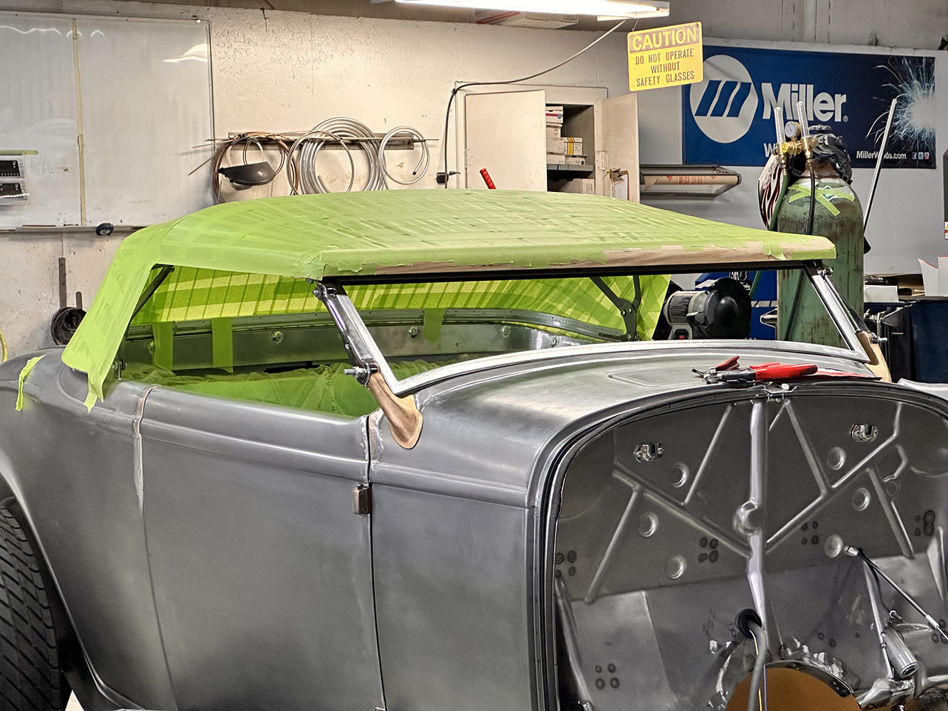 08 1932 Ford Roadster body in bare metal with low slung custom taped convertible top shape