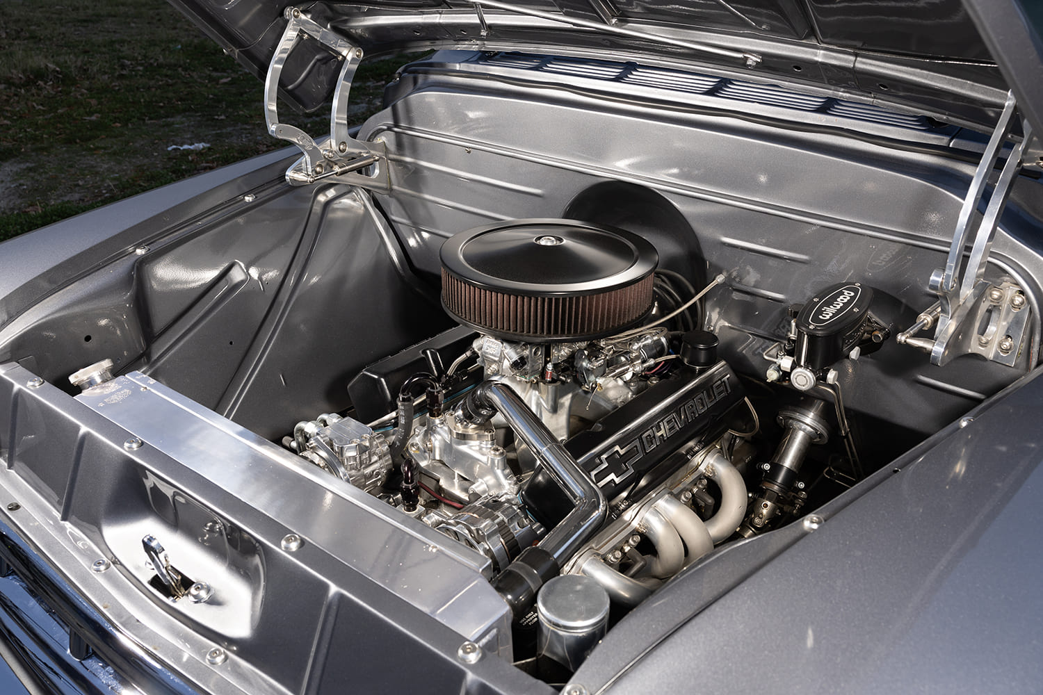 08 1957 Chevy engine bay with SBC V8 Holley carb Chevrolet valve covers and Wilwood master