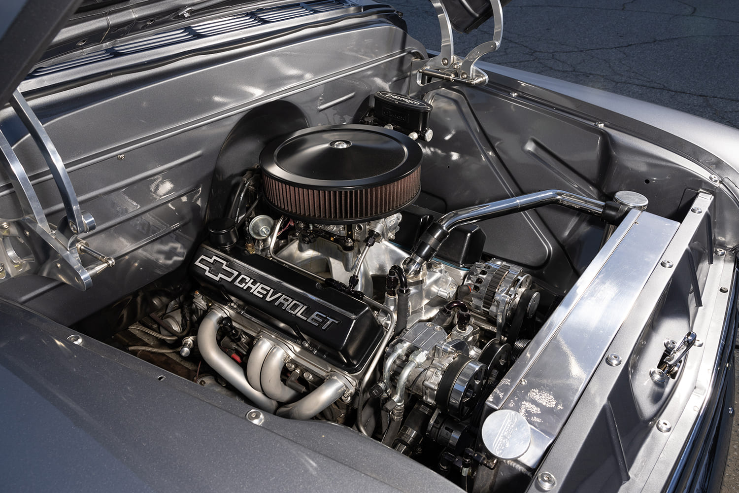 09 1957 Chevrolet small block crate engine with headers serpentine setup and billet hinges