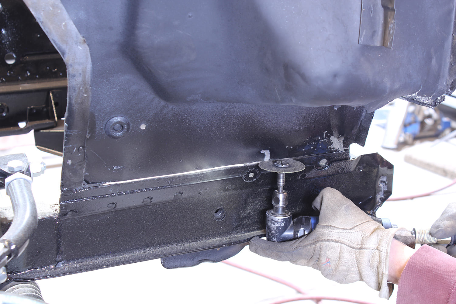 09 Hammer and chisel technique removing radiator support tab from classic Mustang