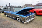 10 1971 Chevrolet C10 Cheyenne Super in two tone blue and silver chrome trim and laid out over polished 5 spokes