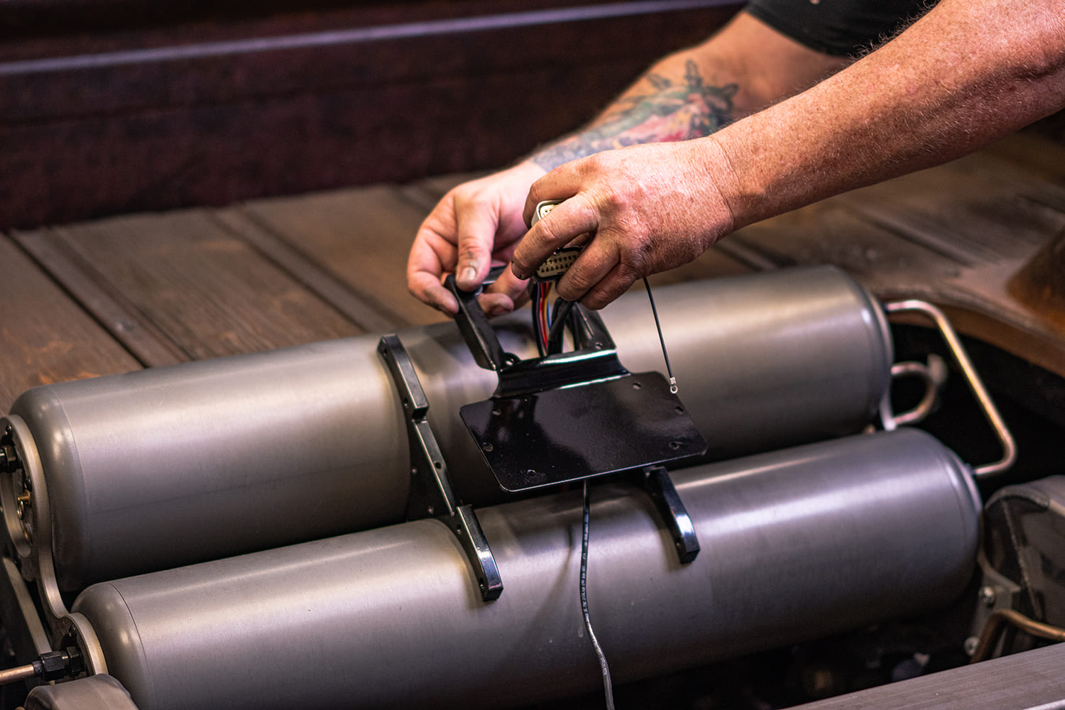 10 Mounting AccuAir VU4 bracket between tanks on 1959 Apache wood bed air ride system