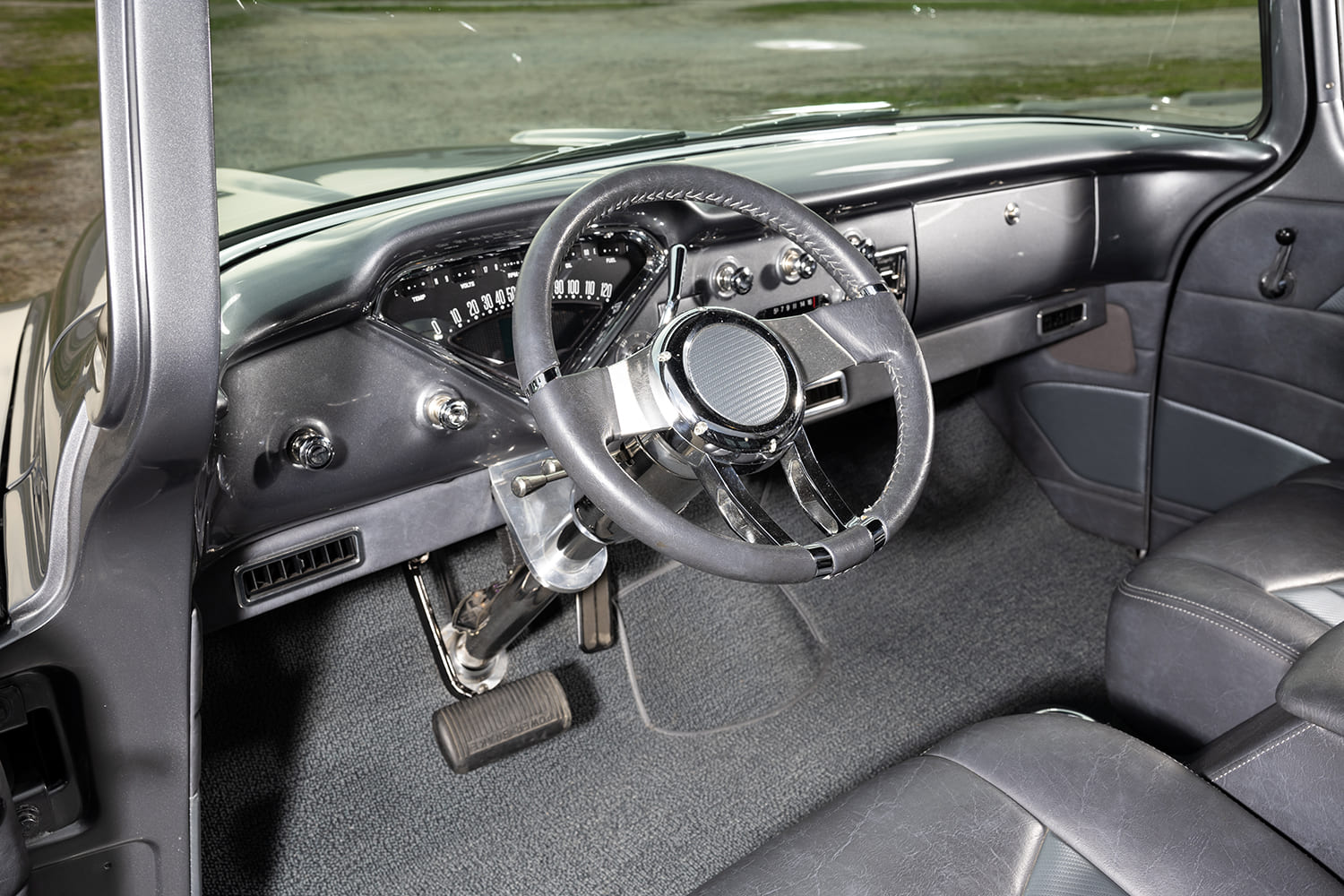 11 1957 Chevy truck custom dash with billet steering wheel and retro style gauges