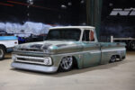 11 1965 Chevrolet C10 patina truck laid out on billet wheels with original trim and custom suspension