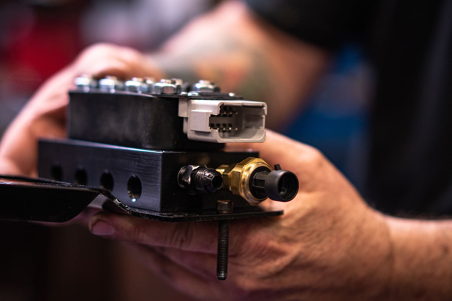 11 Close up of AccuAir VU4 block showing wiring connector and brass air fitting before final hookup