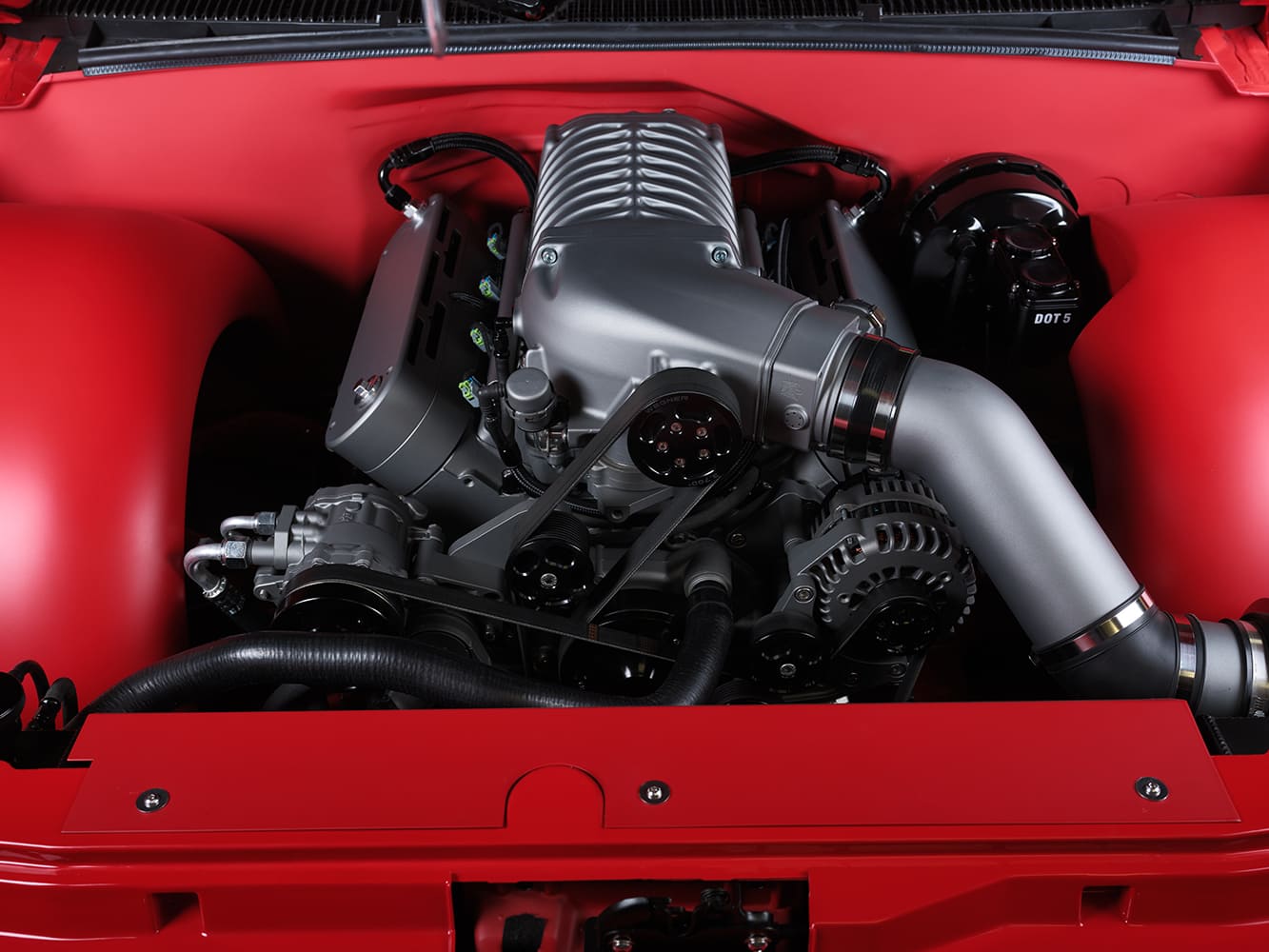 13 1996 Chevy truck engine bay featuring Whipple supercharger and billet accessories