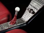 13 Close up 1963 Riviera shifter white ball knob red boot polished aluminum console detail