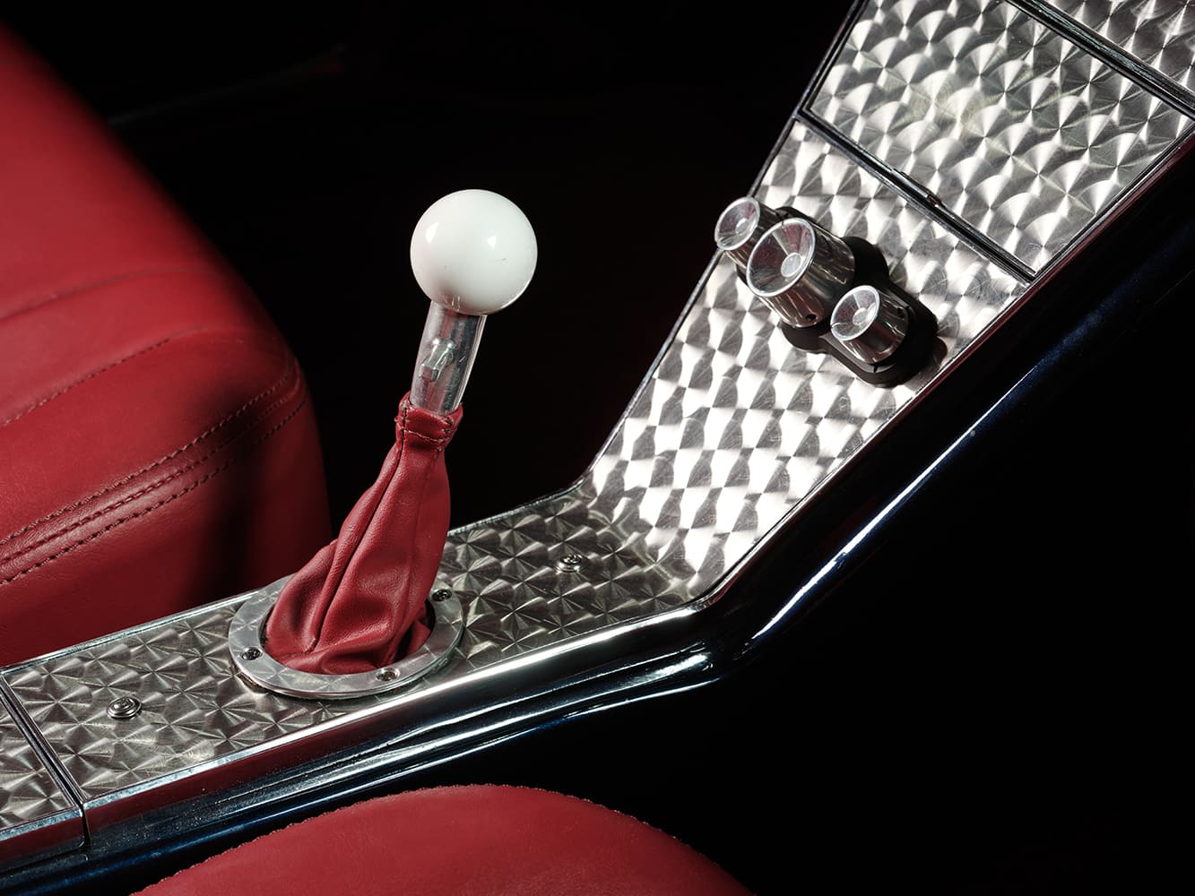 13 Close up 1963 Riviera shifter white ball knob red boot polished aluminum console detail