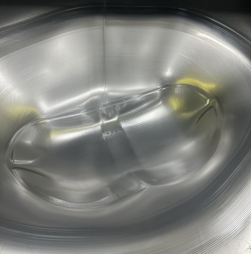13 Deep drawn panel shows high precision contours with fine CNC milling tool marks