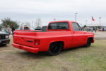 14 1986 Chevrolet C10 Squarebody with shaved tailgate candy red paint and black 26 inch wheels