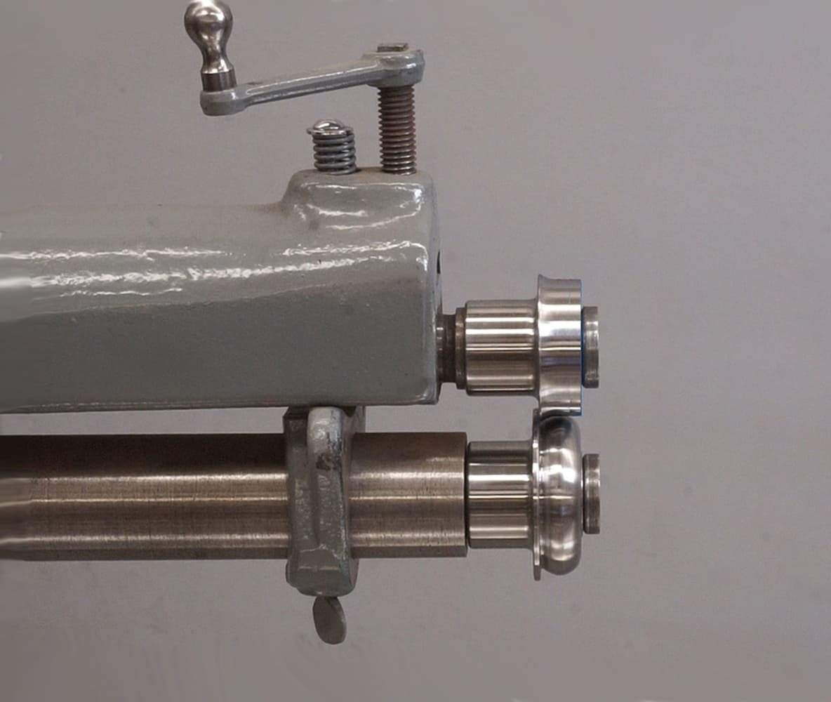 14 Bead roller machine equipped with forming dies for shaping sheet metal