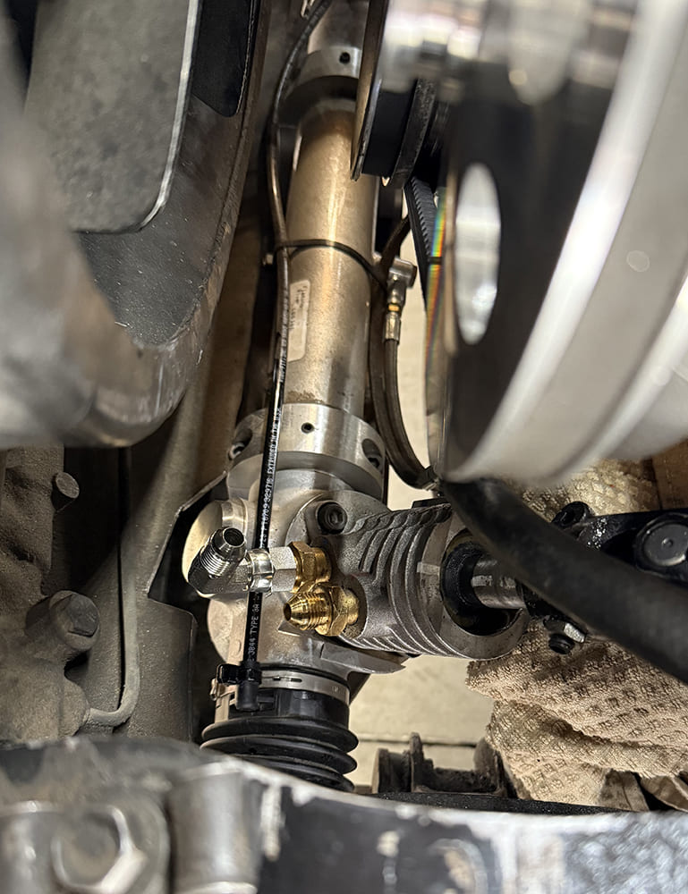 14 braided stainless line routing for remote power steering reservoir