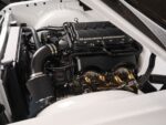 15 Side angle showing 1959 Impala’s cold air intake and Magnuson supercharger tucked cleanly in the bay