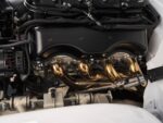 17 Close up of 1959 Impala’s gold ceramic headers and precision TIG welded steering linkage