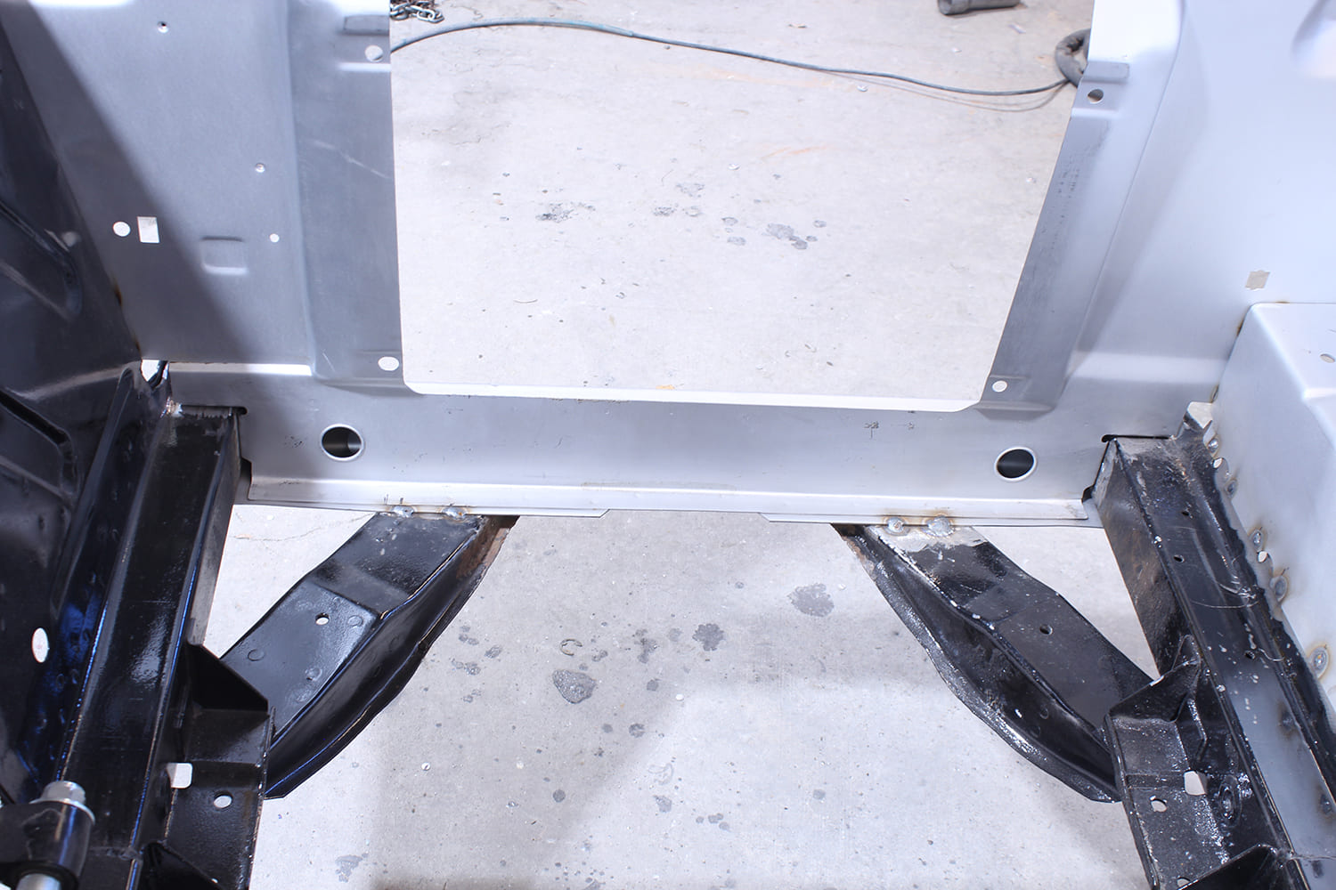 22 Core support panel tacked into place between Mustang frame rails for alignment test fit