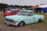 23 1972 Chevrolet C10 in mint green pearl with white interior and tucked multispoke billet wheels
