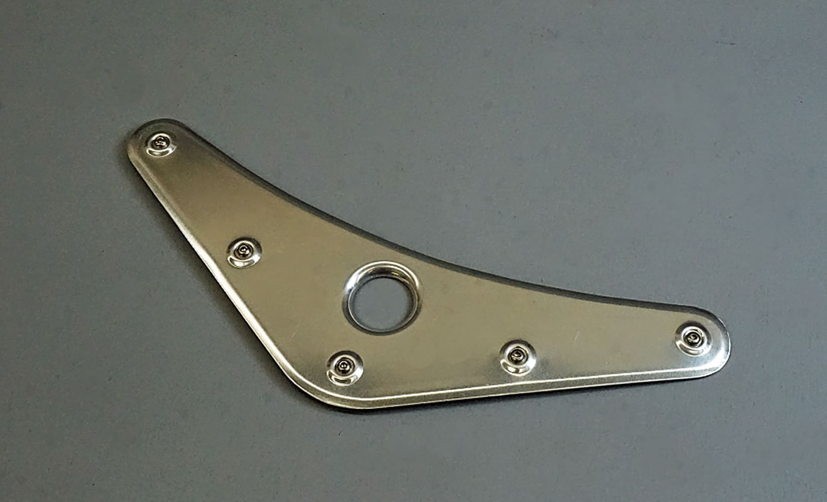 23 Symmetrically dimpled aluminum panel with reinforced mounting holes for added rigidity