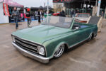 24 1968 Chevrolet C10 convertible in candy green with a smoothed body and big lip directional billet wheels