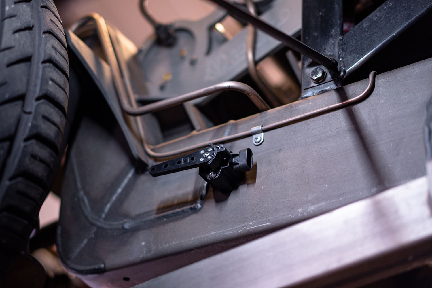 26 Sensor bracket fully mounted and aligned with copper air line above it