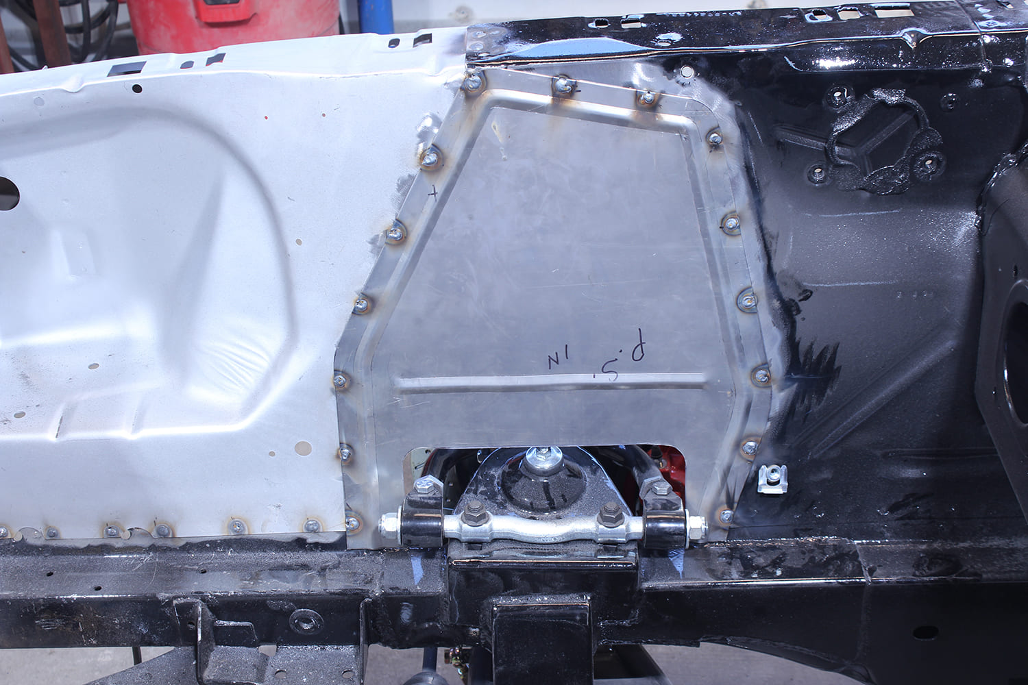 29 Patch panel welded into apron of 1965 66 Mustang with labeled orientation and clean welds