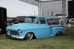 31 1955 Chevrolet Task Force in baby blue with billet wheels and a smoothed bed floor