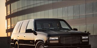 00 1996 Chevy Tahoe OBS with smoothed body billet grille and slammed stance on steel wheels