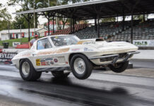 001 1963 Chevrolet Corvette drag car launching hard with wheelie bars vintage gasser style build