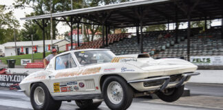 001 1963 Chevrolet Corvette drag car launching hard with wheelie bars vintage gasser style build