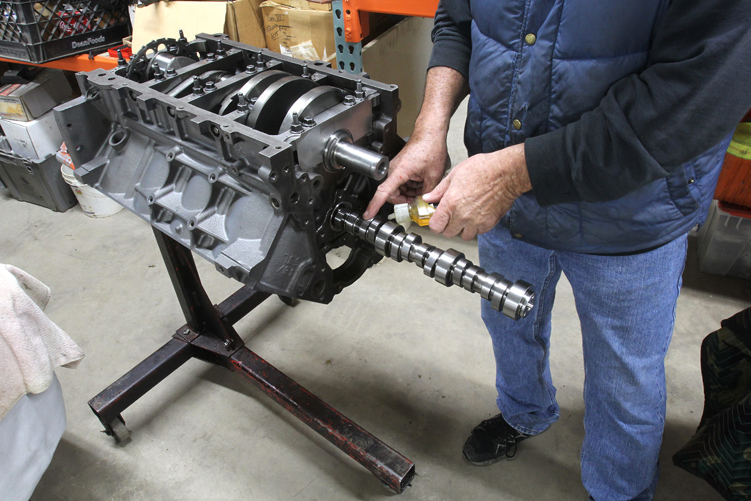 002 LS engine block receiving a new performance camshaft typical of late 90s to mid 2000s builds