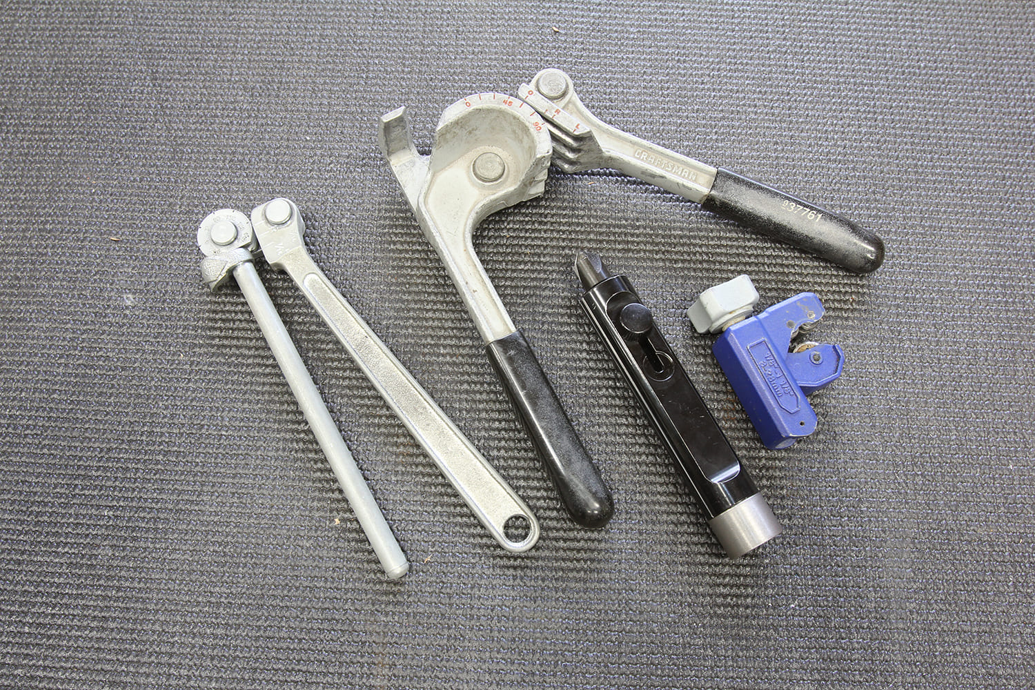 004 Essential tools for brake line bending cutting and flare preparation laid out for fabrication