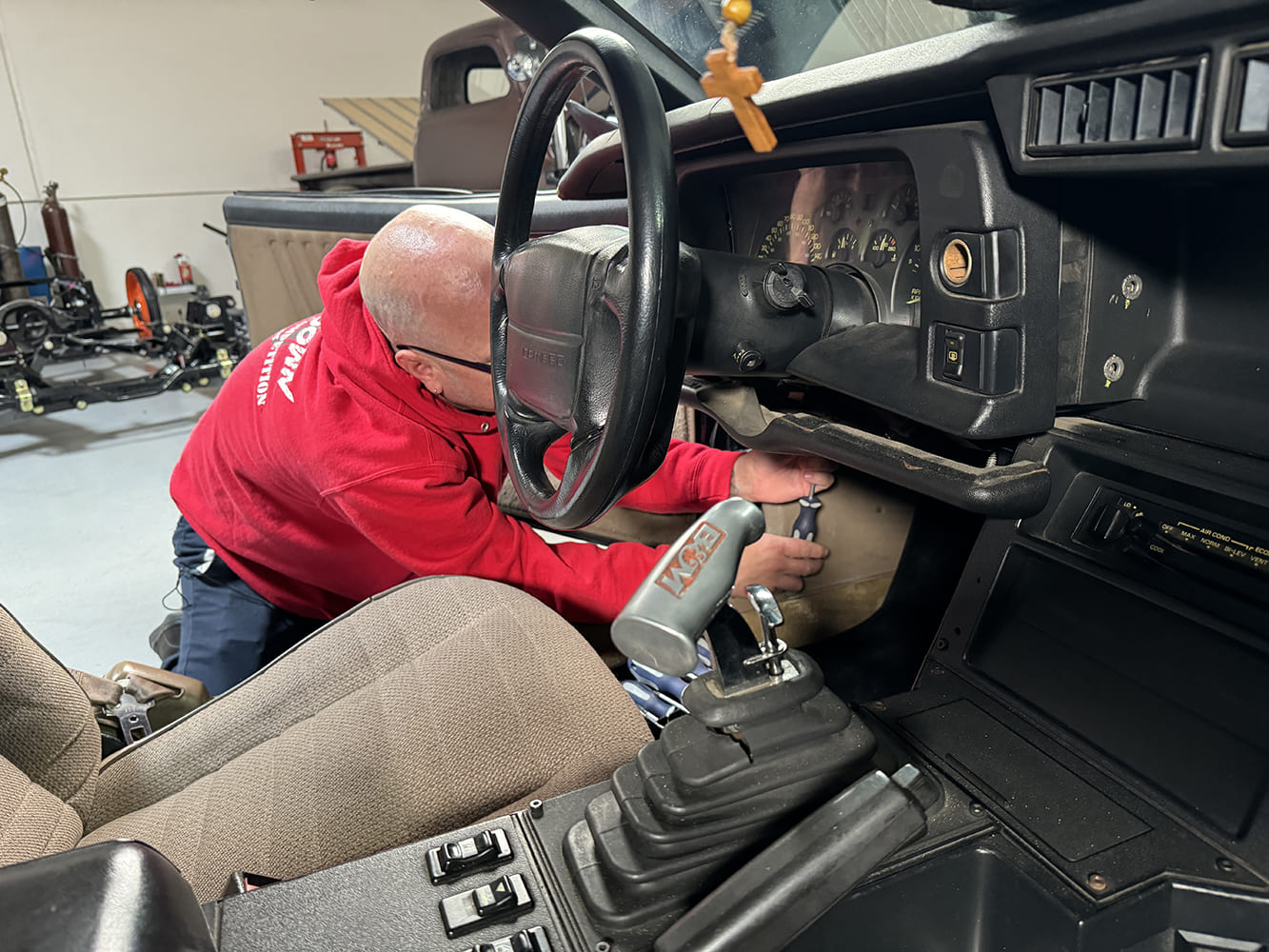 004 technician removing lower dash panel third gen camaro