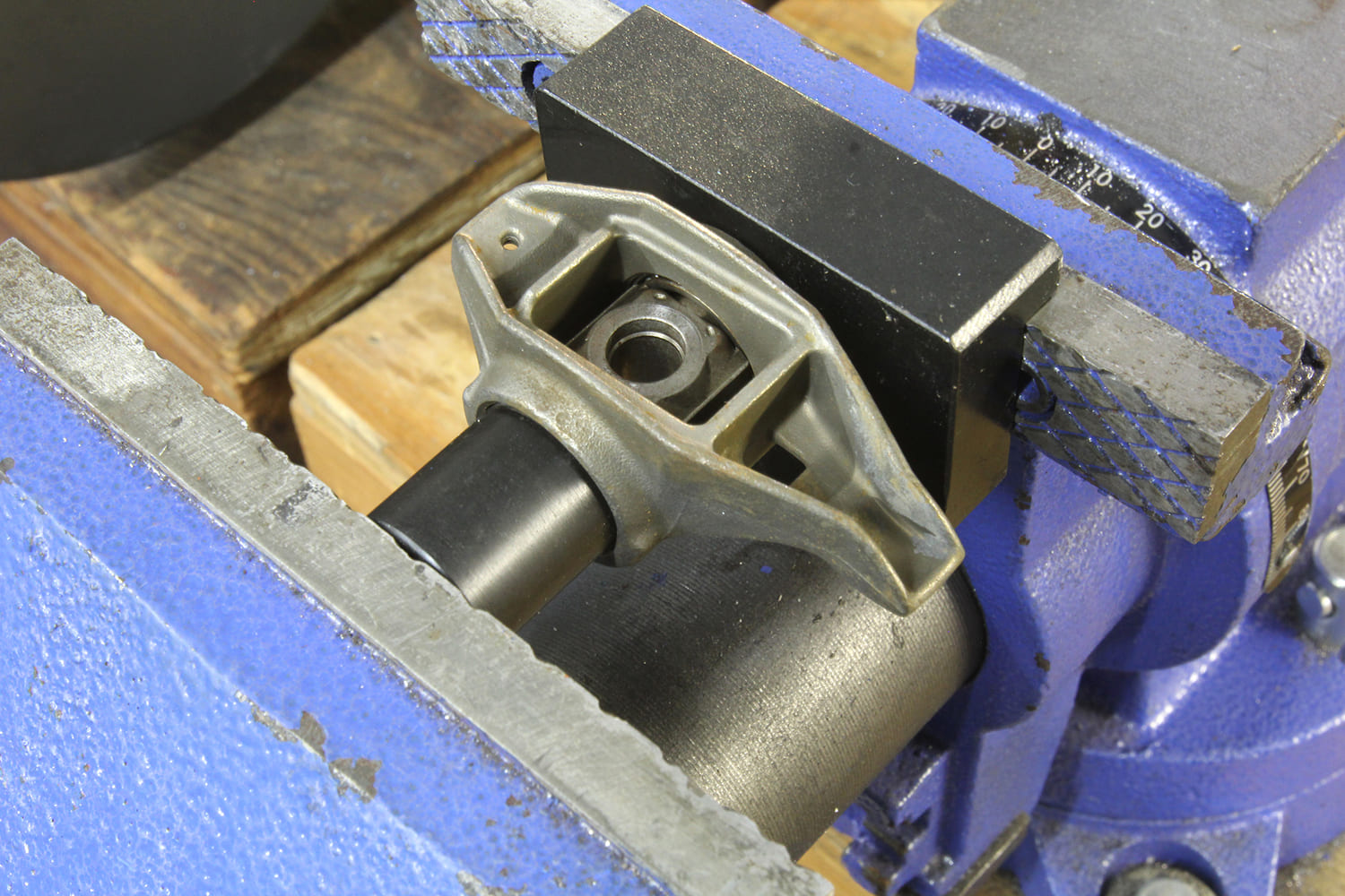 005 Factory GM LS rocker arm on shaft setup being examined found in Gen IIIIV V8 platforms from early 2000s