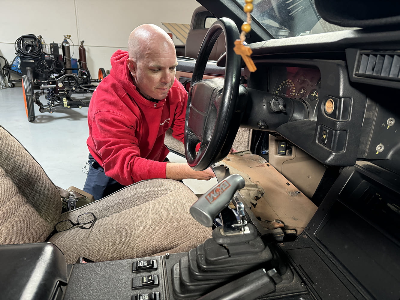006 technician working on dash wiring 80s camaro