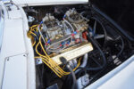 007 Big block Chevy with dual Holley carburetors and gold Shadow valve covers powering the '63 drag build