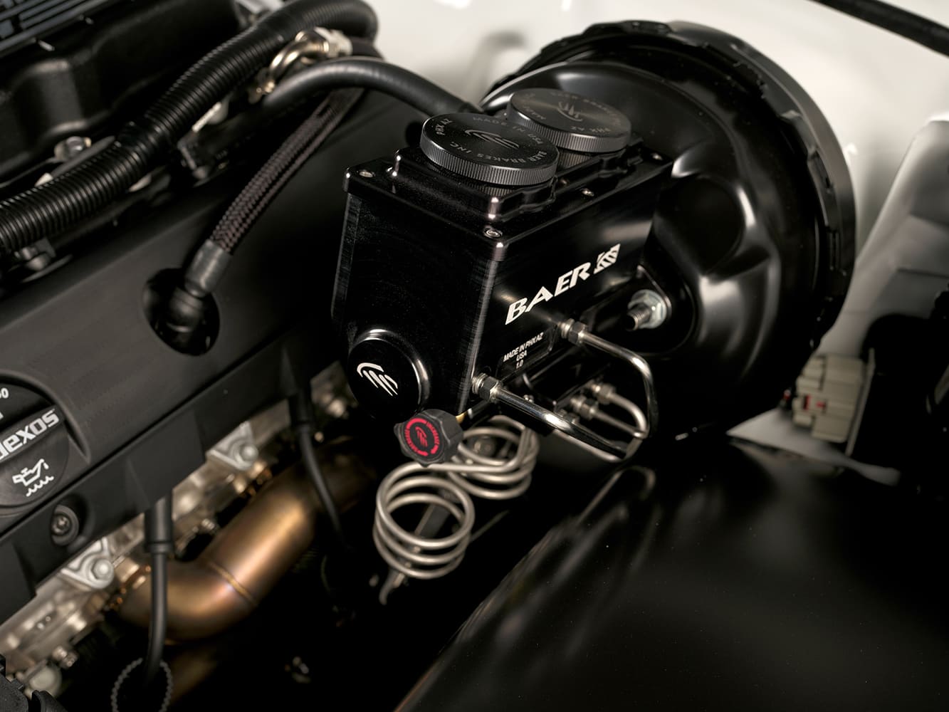 008 1987 Monte Carlo with Baer Remaster master cylinder and booster tucked in a clean engine bay