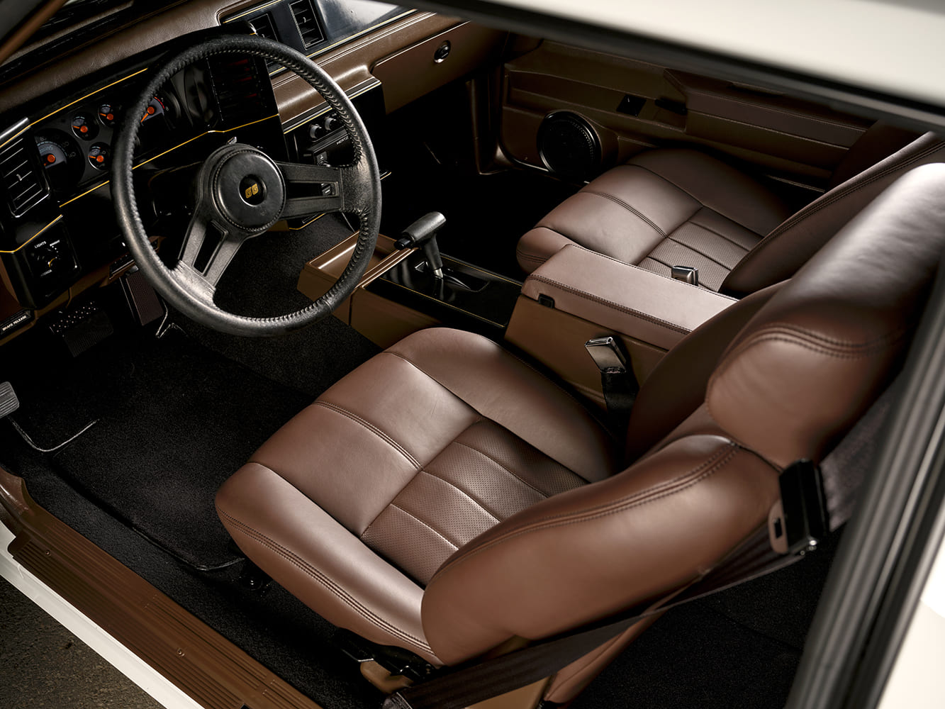 009 1987 Monte Carlo interior with two tone brown leather seats and factory style SS steering wheel