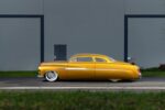 01 1951 Mercury Custom in metallic gold with chopped roof and full fender skirts