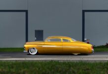 01 1951 Mercury Custom in metallic gold with chopped roof and full fender skirts