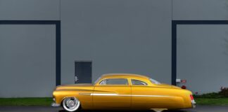 01 1951 Mercury Custom in metallic gold with chopped roof and full fender skirts