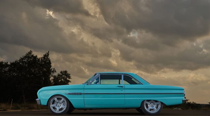 01 1963 Ford Falcon in turquoise with chrome trim and custom 5 spoke wheels