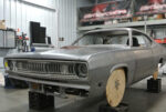 01 1971 Plymouth Duster shell prepped for custom build with bare metal and mock up wooden wheels