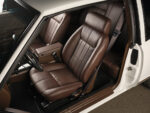 011 1987 Monte Carlo upgraded interior bucket seats with brown stitching and factory seatbelt mounts