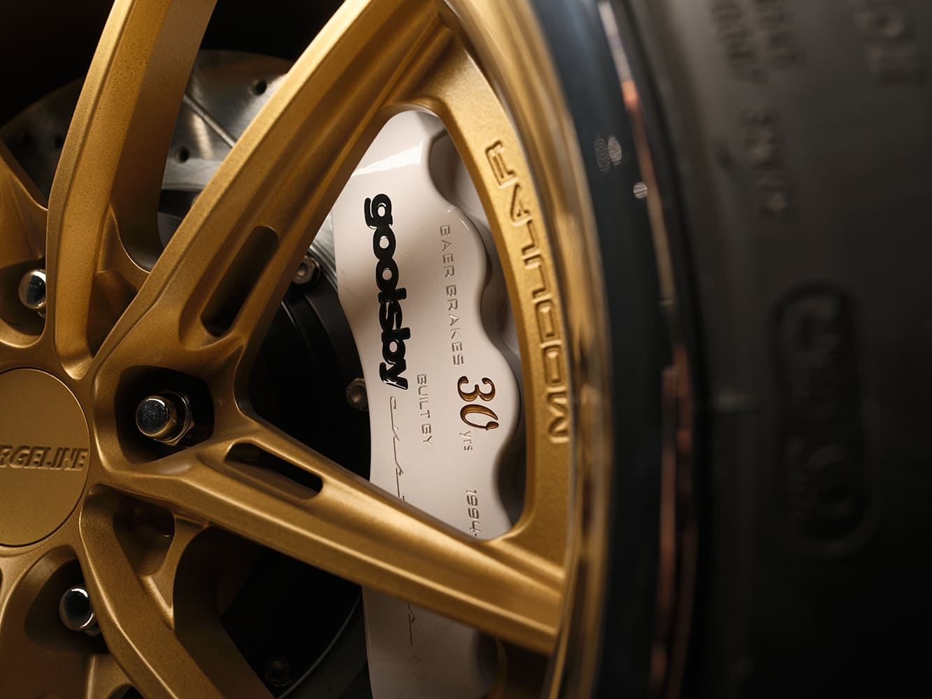 015 1987 Monte Carlo rear wheel showing Baer Brakes and Goodsby 30th caliper branding