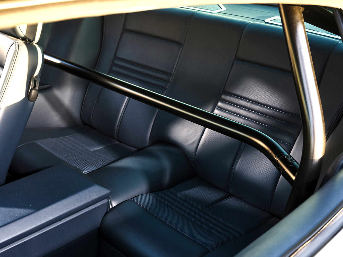 016 1970 Camaro rear seats with custom stitch and roll cage